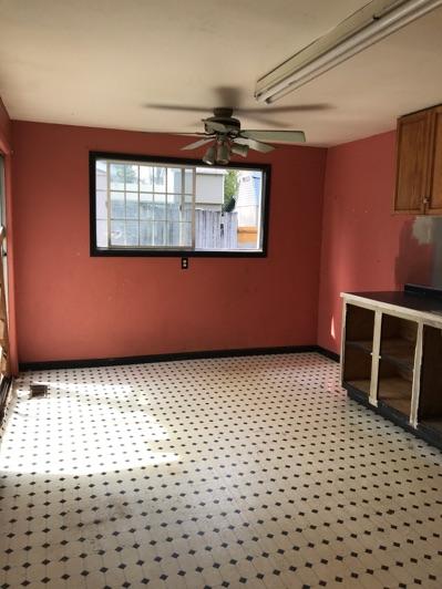 1. Kitchen Room Kitchen Walls and ceilings appear in poor condition overall. Flooring is linoleum in poor condition. Heat register present. Accessible outlets operate. Light fixture operates.
