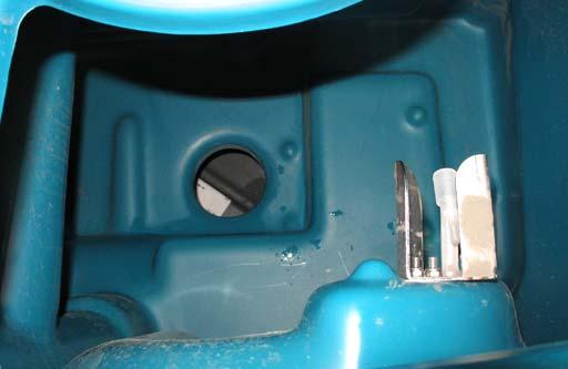 Clean the drain hole, then reinsert the drain plug.