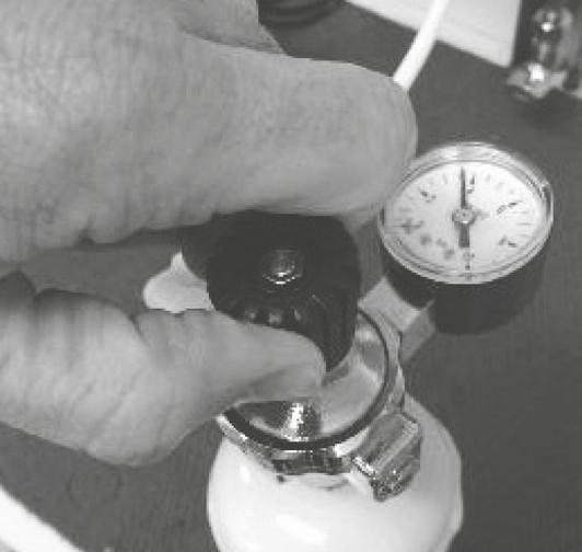 Turn off the CO 2 regulator by turning the black knob anti-clockwise. 3.