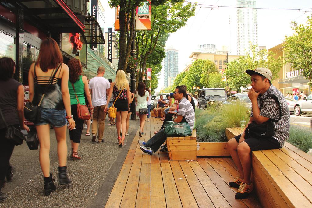 Sidewalks provide space for walking and gathering, as well as store displays, patios and other features that enhance public life.
