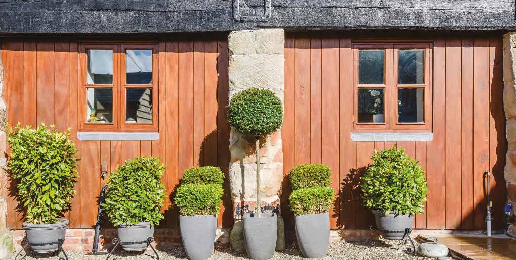 This half-timbered, part sandstone barn has character and charm in abundance with a very appealing modern twist.