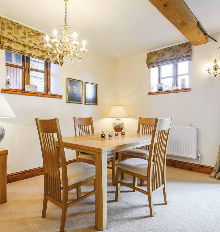 LARGE FAMILY KITCHEN: - This beautiful kitchen, truly has the wow factor, large, spacious, with triple aspect windows and exposed beams.
