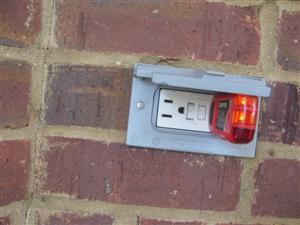 7.5 (1) Exterior GFCI (ground fault circuit interrupter) outlet right of back door not tripping with outlet test button or test tool.