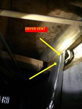 Dryer vent was pinched closed in the area of the