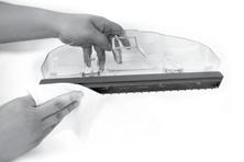 running water Remove any debris from squeegee by