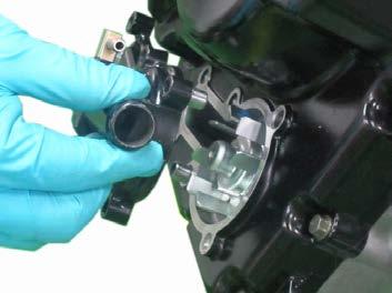 Allow any remaining coolant to drain into a suitable