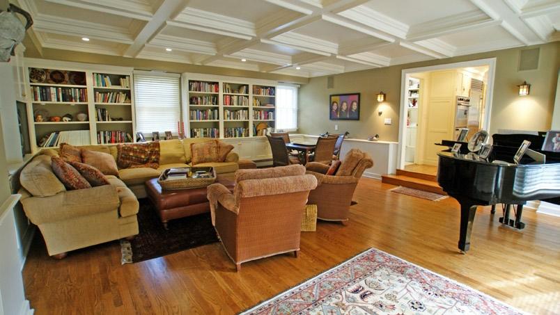 supply cozy warmth. Across the foyer, the formal dining room will easily seat a party of ten or more.