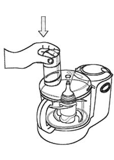 Ensure that the lid tab has "clicked" into place and that the arrow on the lid is aligned with the dot on the unit. Insert food pusher into feed chute. (Fig. 6 & Fig. 7) Fig. 6 Fig. 7 5.