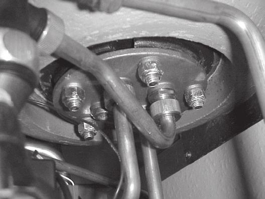 Undo union nut at 'T' piece to remove temperature pressure relief valve over flow pipe.