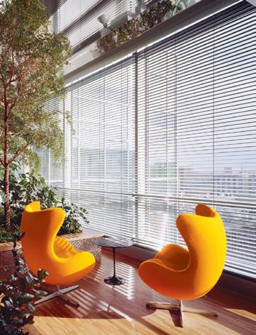 workplaces Highly reflective inverted blades direct daylight deep into the building s interior Perforated slats optimize