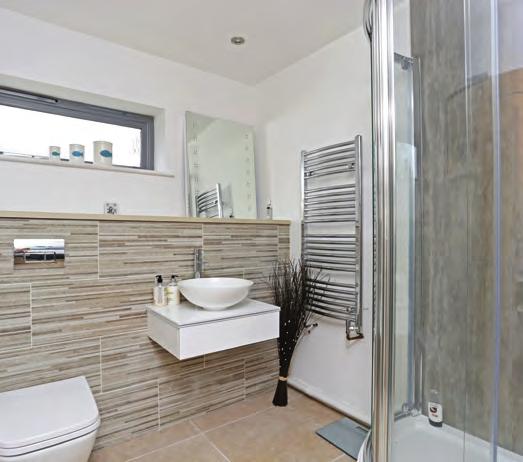 room, dressing room and balcony. Three further double bedrooms. Family bathroom.