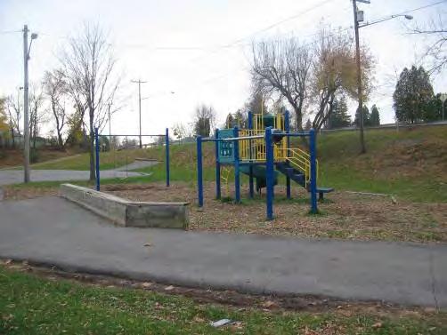 Village of North Syracuse Parks Master Plan 1. Add two storm water catch basins and storm water outlet piping. 2. Add 2 benches and 2 picnic tables at the play structure area for parent supervision.