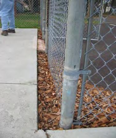 Replace the concrete walks around the existing swimming pool, walks should extent out to the perimeter fencing. Signage System The park signage system is limited to a few signs.