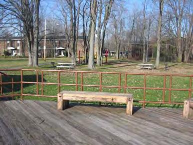 Village of North Syracuse Parks Master Plan Park Pavilion with deck: The pavilion is octagon in shape with a large wood deck that is used for outdoor