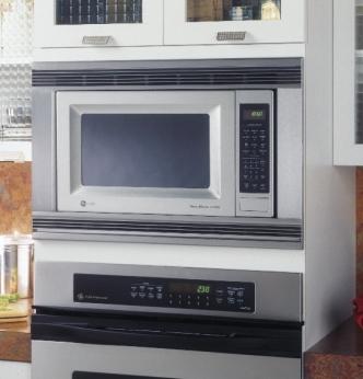 Customize your kitchen with built-in microwave options A countertop microwave oven built-in with a trim kit.