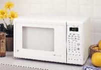 Convenience Control Microwave with Turntable JE635WW White on white Compact.6 cu. ft.