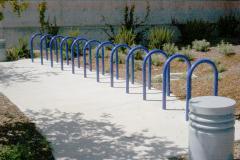 Bike Racks In ground, inverted u style bike racks should be placed near businesses and other uses throughout the