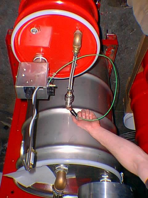 prior to operation. Remove the 2 plug from the condensation drum fill hole. Pour 36 gallons of intended solvent into hole using a funnel (not provided).