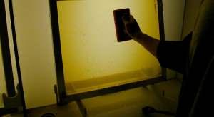 If you coat under normal lights you can pre-expose the stencil making it impossible to washout and wasting your time.