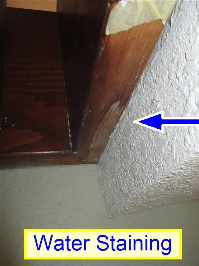 (2) Ceiling Water Stain. There was some water staining noted on the ceilings of the main entry stairway. It appears that there have been a roof leaks at these locations at one time.