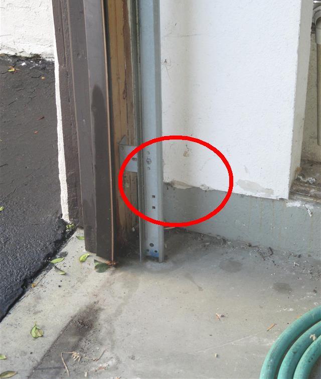 ) safety beam (six inches from ground) was not installed or not in operation at time of inspection. This device is designed to retract the garage door when he beam is broken (2.