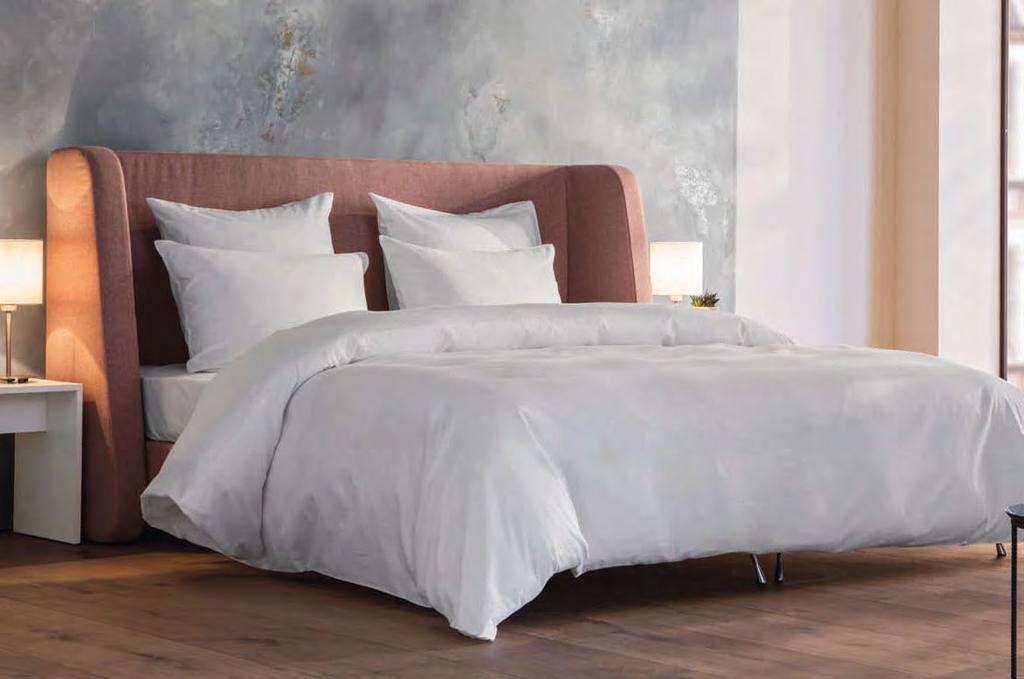 modern upholstered bed ARYA DENVER with its curved back is an
