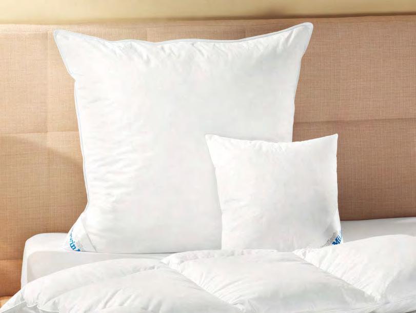 You will receive the pillow in a practical storage bag. Quality made in Germany. Filling: 80% white new feathers, 20% white new down. Cover: 100% cotton, twill with tuck.