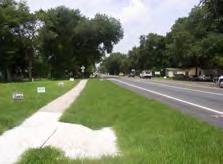 The existing 2-lane rural roadway will be reconstructed as a 5-lane urban roadway with concrete curbs and gutters, bicycle lanes and sidewalks on both