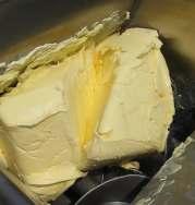 This operation allows regaining the properties of butter as it was prior to cooling and allows water dispersion.