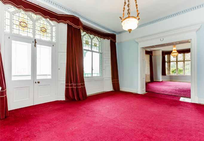 Internally there are gracious reception rooms with fine panelling, handsome fireplaces and ornate plasterwork, being described as a good example of the fertile imagination and sensitivity of the late