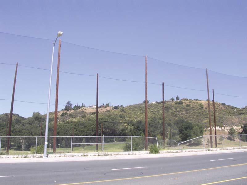 View 9: View looking northwest from Tujunga Canyon Boulevard toward the project site.
