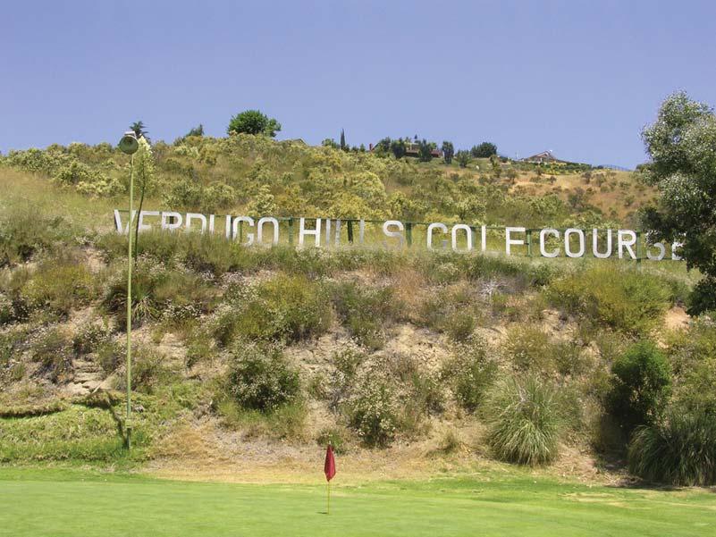 View 11: View looking northwest at the wooden Verdugo Hills Golf Course sign, as seen from the interior of the golf course.