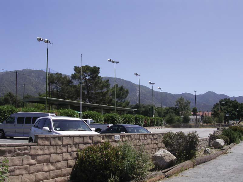 View 7: View looking northeast toward the driving range from the south side of La Tuna Canyon Road. In the foreground are the existing parking lot and the low, sparsely vegetated concrete block wall.