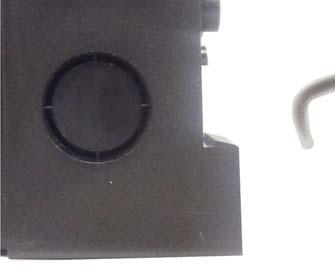 Guide the DIN rail upper lip into the mounting tabs containing the compression springs. 3.
