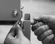 Figure 5 Place a second large washer on the bolt, then secure one of the smaller