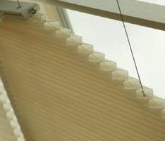 C e l l u l a r S h a d e s Luxaflex custom make blinds for both roof and side windows whatever your style of conservatory.