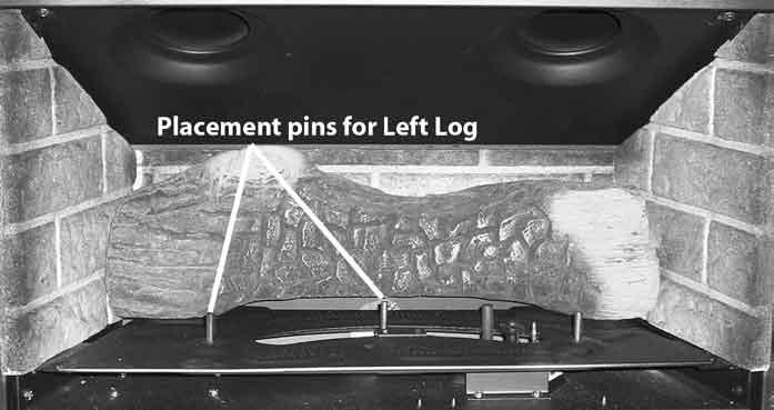 The burner (shown in Figure 11), and a few of the logs come with placement pins, notches and ledges, which make alignment easier.