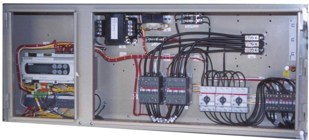 The left-hand section contains the microprocessor controller and control input and output terminals. All high-voltage components are located on the right side of the panel.