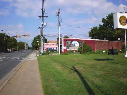 It is comprised of one- to two-story commercial buildings, as well as civic institutions including the YMCA and the American Legion Post 139. Boulevard.