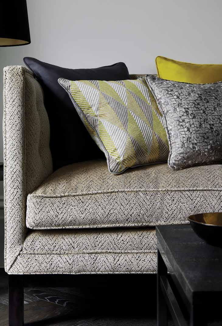 Contemporary accents like sulphuric yellow react with layered neutrals for elegant interiors with a glamorous