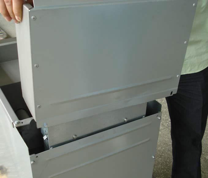 Make sure that the nuts are installed on the inside of the floor flyer cabinet.