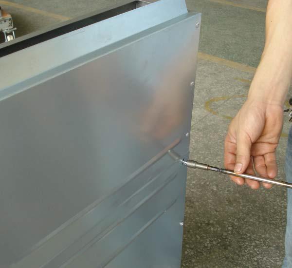 Lower the fryer, careful not to drop or allow the fryer to fall. 6. Use a level to make sure that the fryer is level.
