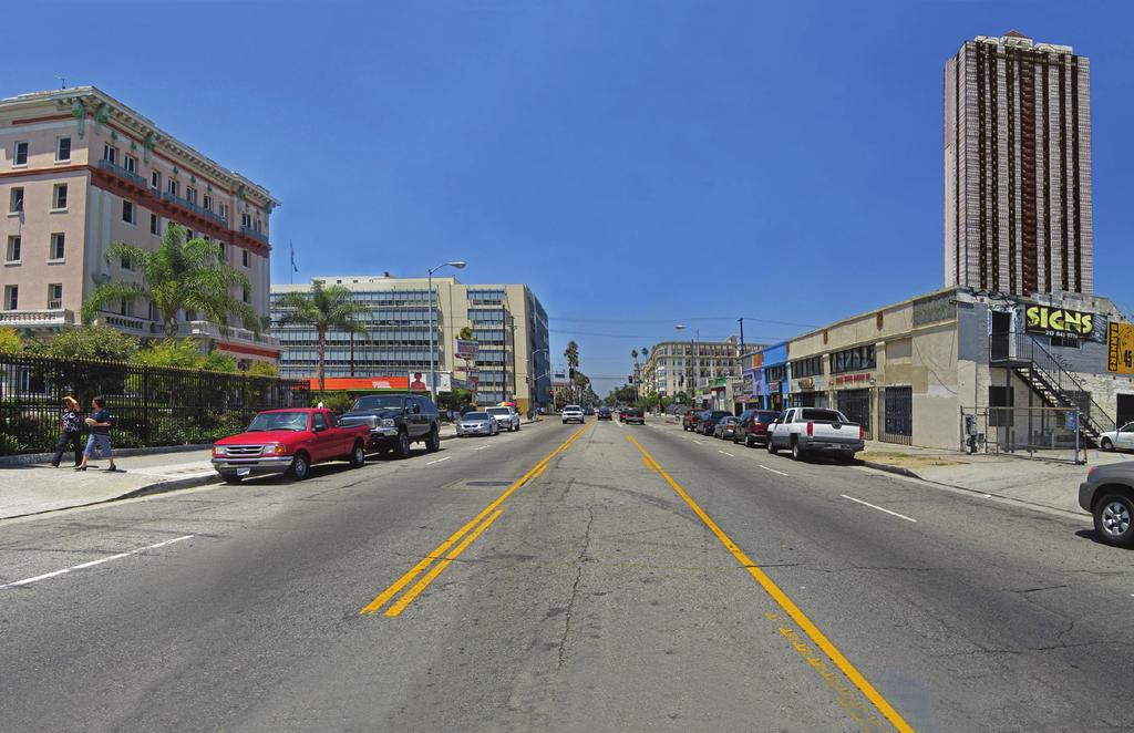 View looking north along West Adams Boulevard (before). View looking north along West Adams Boulevard (after).