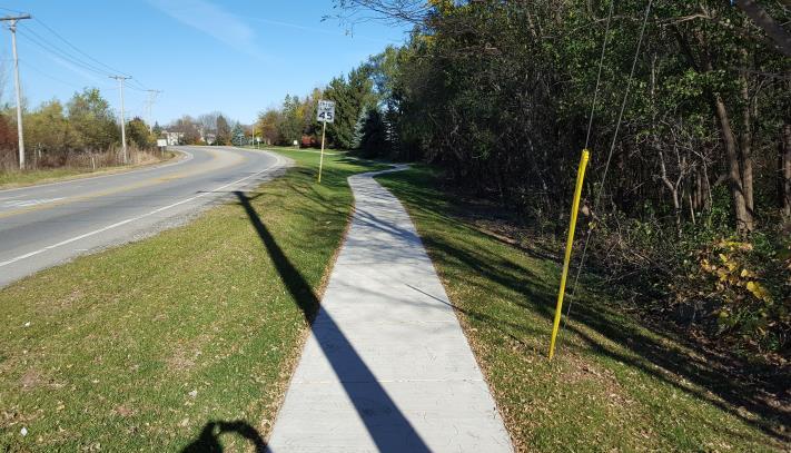 MIDLOTHIAN ROAD PRE-PROJECT Scope: The scope of work included the installation of new sidewalk and associated landscape restoration.