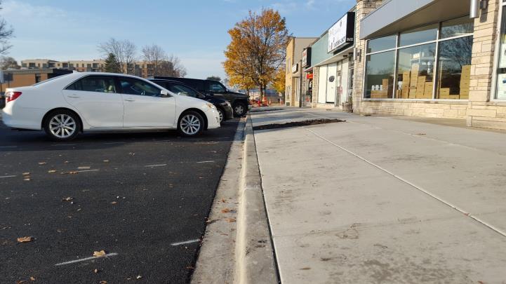EAST HAWLEY STREETSCAPE PRE-PROJECT Scope: The scope of work included, re-orientation of on-street parking ADA accessible sidewalk and ramps drainage improvements paving and striping street trees and