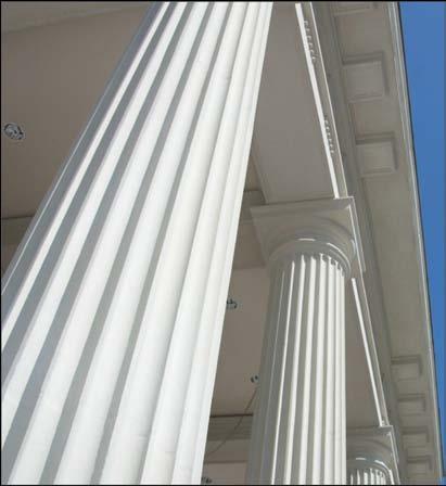 The fluted columns were one piece tapered units that were 23' tall including the base and capital and were engineered to carry the gable above.