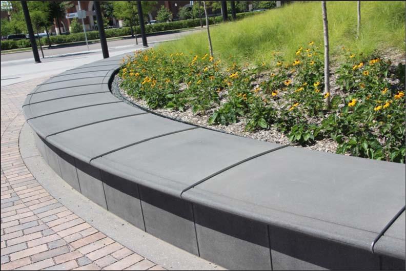 The cast stone site-walls and seat-walls are part of the streetscape,