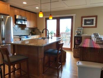 1. Kitchen Room Kitchen Walls and ceilings appear in good condition overall. Flooring is wood. Heat register present. Accessible outlets operate. Light fixture operates.