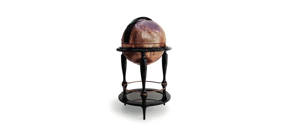 Mixing two necessities of perfect lifestyle, traveling and celebrating. The Globe is made from polished copper, manually hammered. In its interior re is space for glasses and bottles.