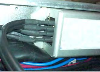 Connect the insulated male connectors of the door heater harness to